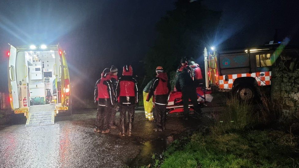 Rescuers attend a callout in December in the dark
