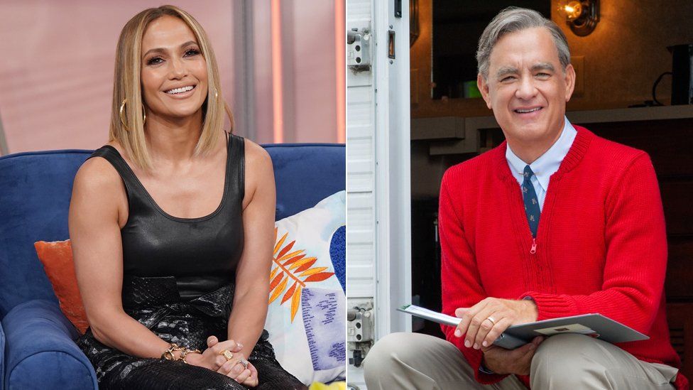 Jennifer Lopez and Tom Hanks as Fred Rogers in A Beautiful Day in the Neighborhood