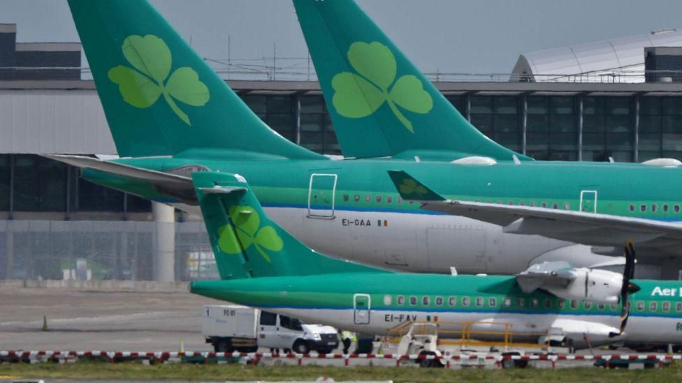 Three grounded aer lingus planes on the tarmac at Dublin airport
