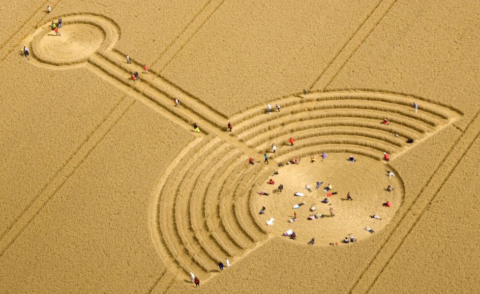 Aerial view of people in a crop circle in Wiltshire in 2010