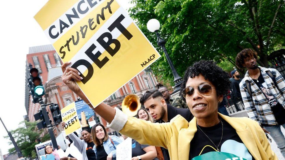 Student loan borrowers gather near the White House