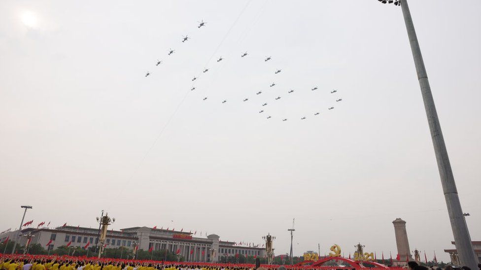 Aircraft from the Chinese People's Liberation Army (PLA) air force fly in formation during a parade to celebrate the the 100th founding anniversary of the Chinese Communist Party at Tiananmen Square on July 1, 2021 in Beijing, China.