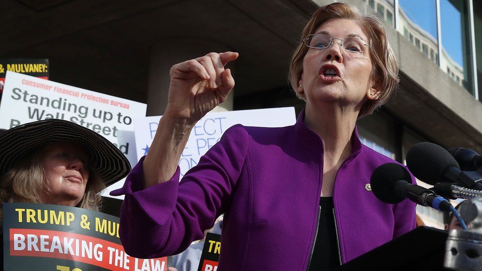 Sen. Elizabeth Warren (D-MA) speaks during a protest in front of the Consumer Financial Protection Bureau (CFPB) headquarters on November 28, 2017