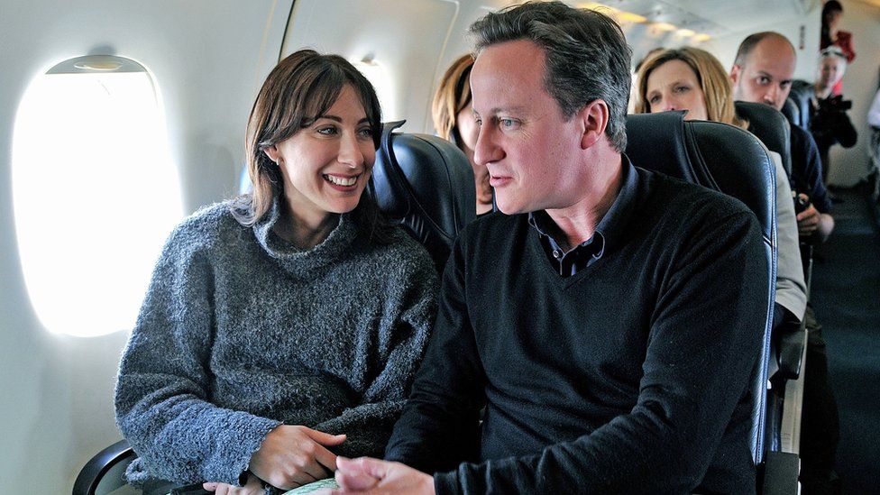 David Cameron and his wife Samantha Cameron on a plane in 2010