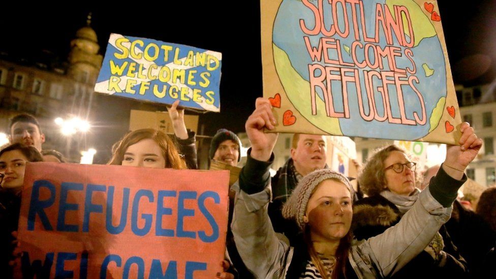 Refugees welcome protestors