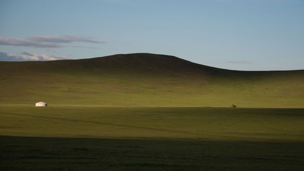 A traditional ger tent and a man on horseback near Zuunmod, south of Ulan Bator
