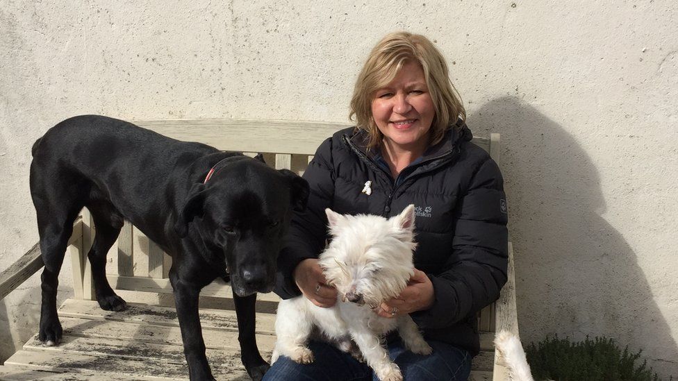 Debra Dorrans with her two dogs, Benny and Sam
