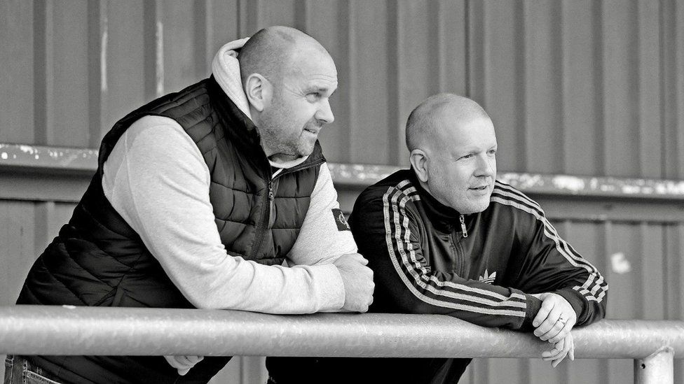 Mark Jones and Simon Compton (right) on football stand