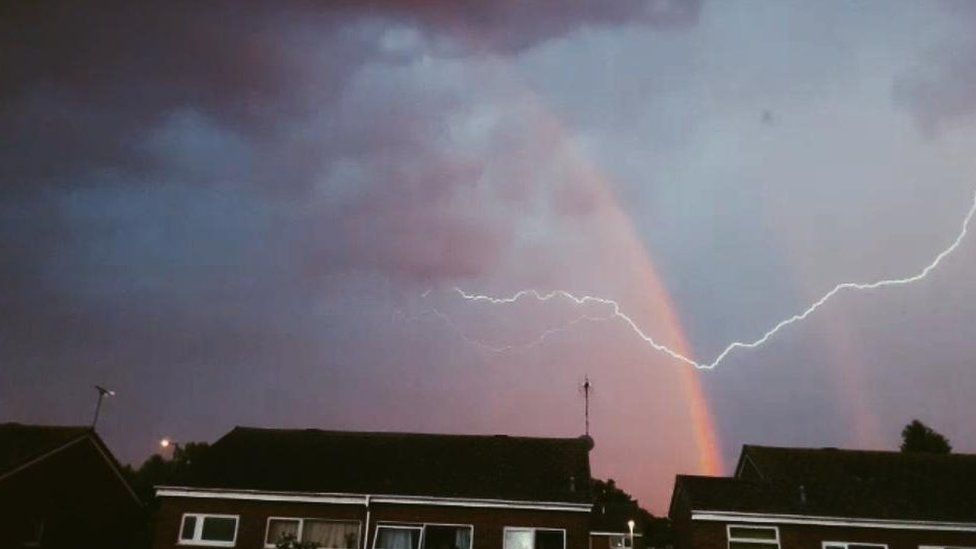 Lightning over a rainbow