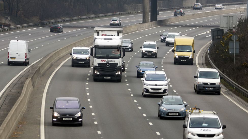 Cars on the M3 smart motorway near Longcross in Surrey