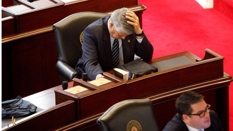 Republican State Senator Norman Sanderson holds his head while fellow Republican Senator Andrew Brock looks during a failed attempt to repeal the controversial HB2 law limiting bathroom access for transgender people in Raleigh, North Carolina