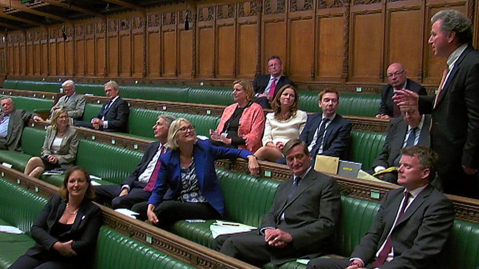 A number of former Tory rebels are still sat with Conservative MPs at the debate