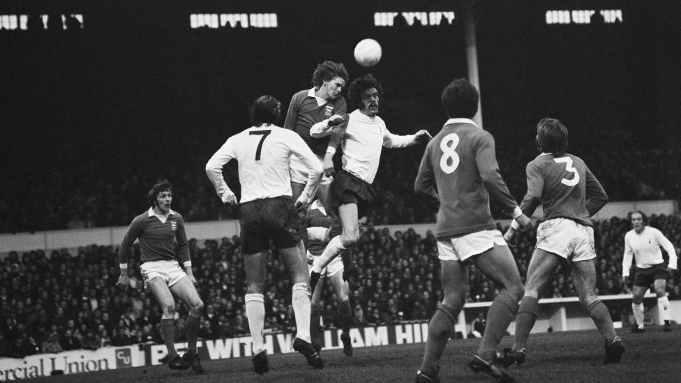 Trevor Whymark heading the ball in a game against Tottenham Hotspur