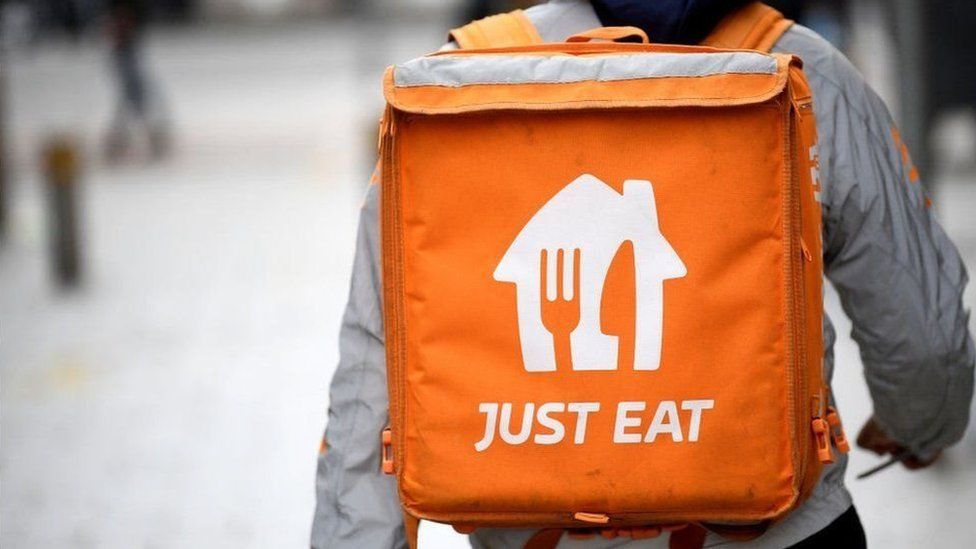 A Just Eat delivery person