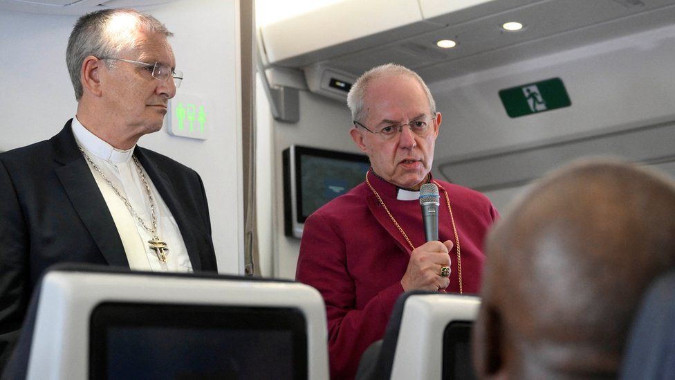Archbishop of Canterbury Justin Welby and Church of Scotland's Iain Greenshields address the media while aboard the plane from Juba to Rome