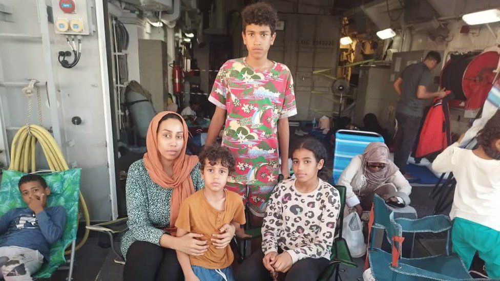 Azza and her children on a Spanish ship headed to Jeddah
