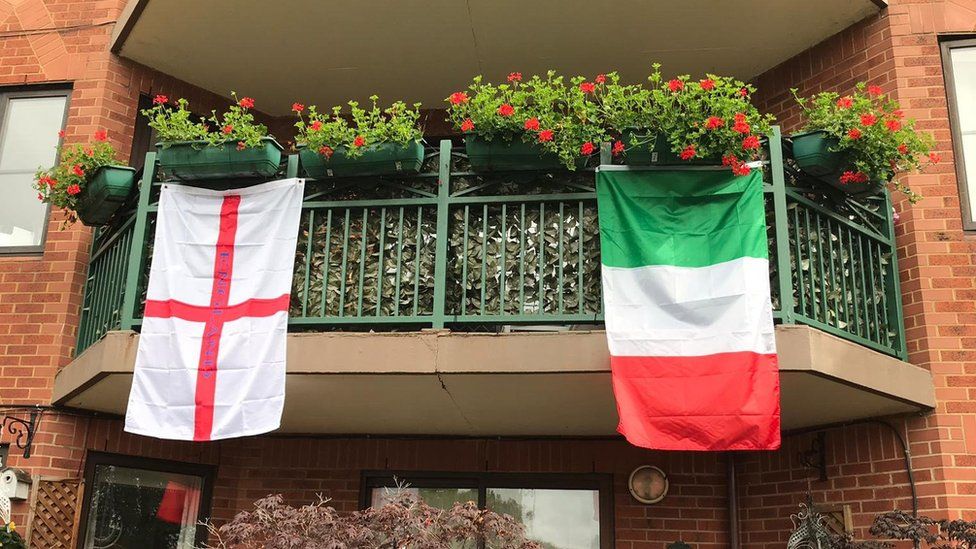 England and Italy flags together in Bedford