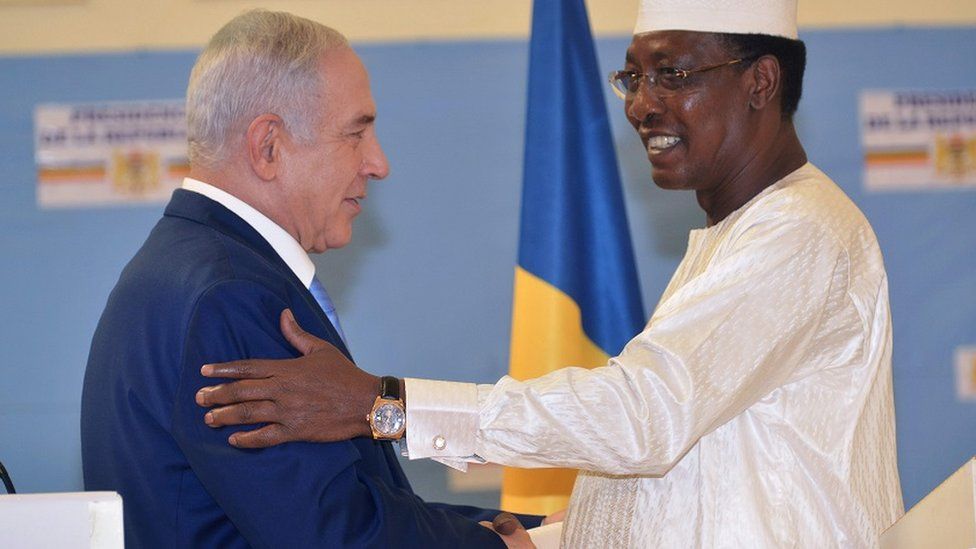 Chadian President Idriss Deby Itno (R) shakes hands with Israeli Prime Minister Benjamin Netanyahu during a meeting at the presidential palace in N"Djamena on January 20, 2019