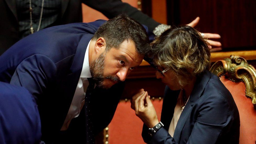 Matteo Salvini (L) and Giulia Bongiorno gesture in the Senate in Rome, Italy, August 5