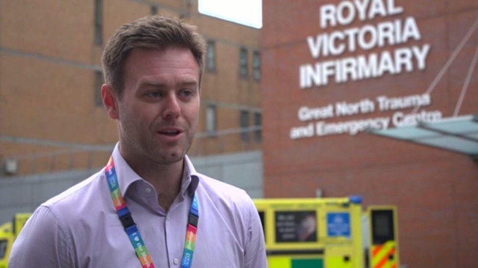 Dr Chris Gibbons speaking outside the Royal Victoria Infirmary