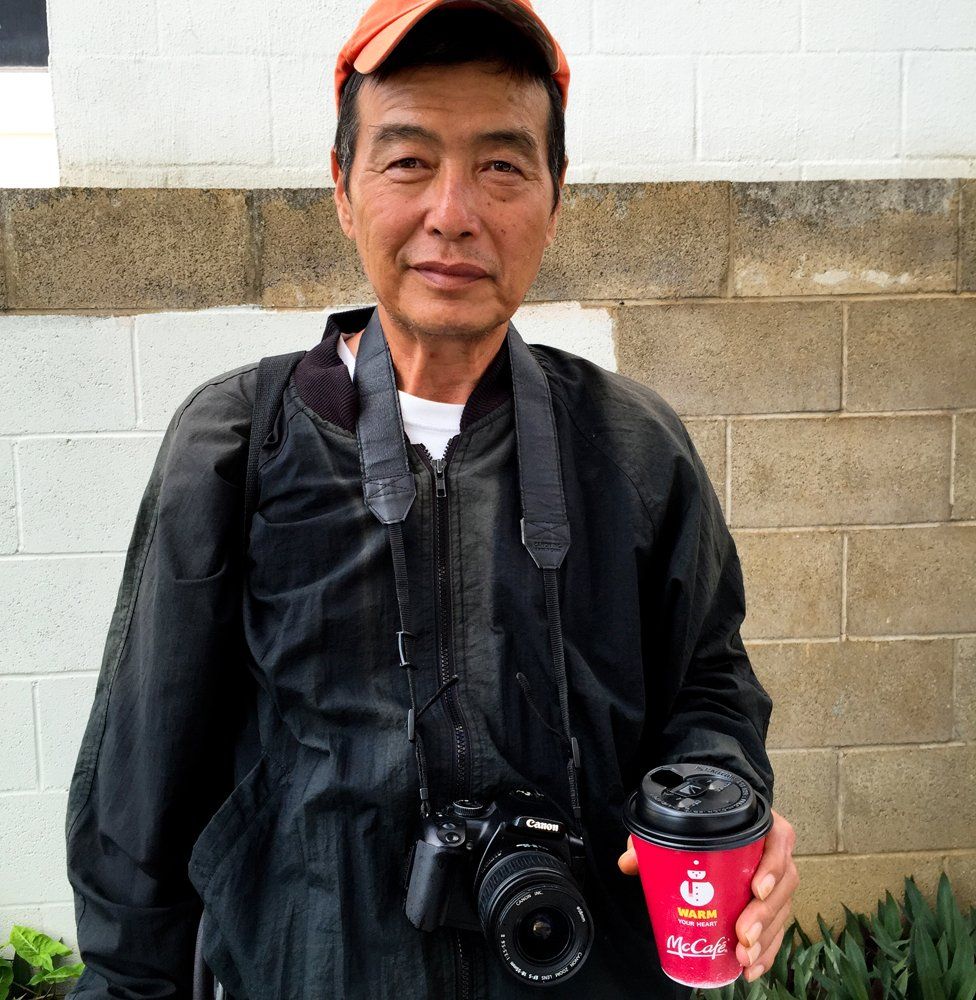 Diana Kim's father with the camera she gave him, in December 16, 2014