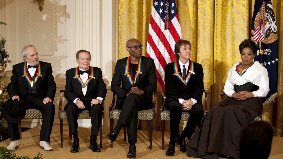 Paul McCartney next to Oprah Winfrey at the White House