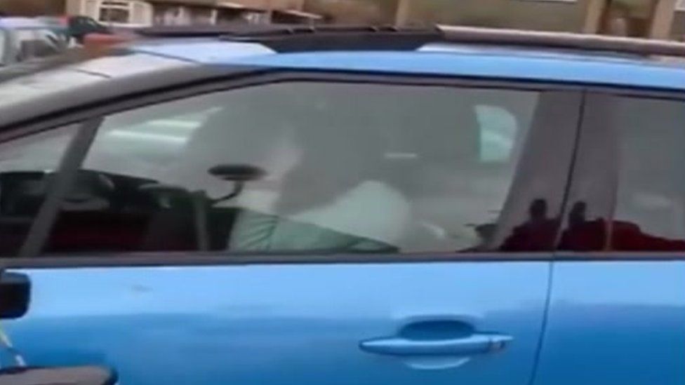 Occupants inside a car being rammed