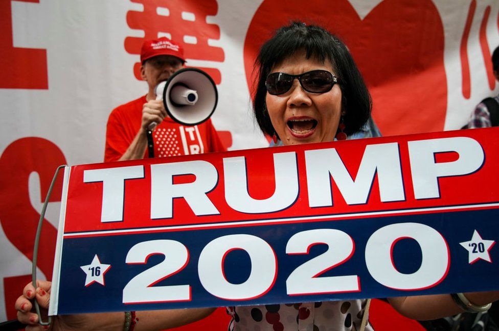 The group Chinese Americans For Trump holds a rally outside Trump Tower in June 2019