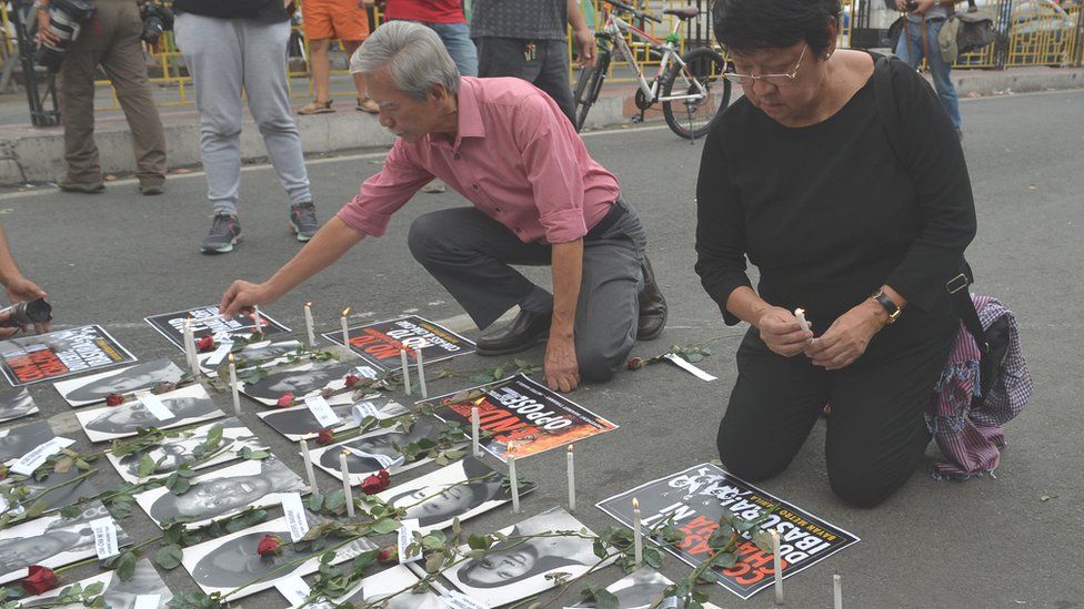 Judy Taguiwalo and Satur Ocampo attend a People Power anniversary march in 2018.