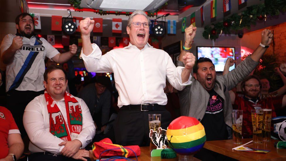 Sir Keir celebrates an England goal during a 2022 Fifa Wold Cup match against Wales