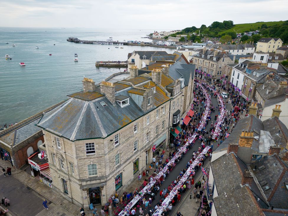 Hundreds of people take part in the town's street party on 3 June 2022 in Swanage, Dorset