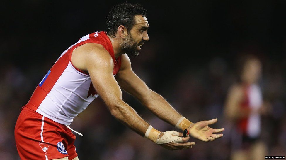 Indigenous Australian footballer Adam Goodes gestures during the Sydney Swans clash with St Kilda in Melbourne