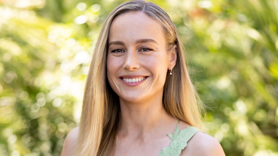 A head and shoulders shot of Brie Larson wearing a green dress as she attends the photocall of the Filming Italy 2024 on June 22, 2024 in Santa Margherita di Pula, Italy