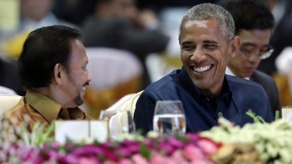 Brunei"s Sultan Hassanal Bolkiah, left, and U.S. President Barack Obama talk at the ASEAN Gala Dinner at the National Convention Center in Vientiane, Laos, Wednesday, Sept. 7, 2016. (AP Photo/Carolyn Kaster)