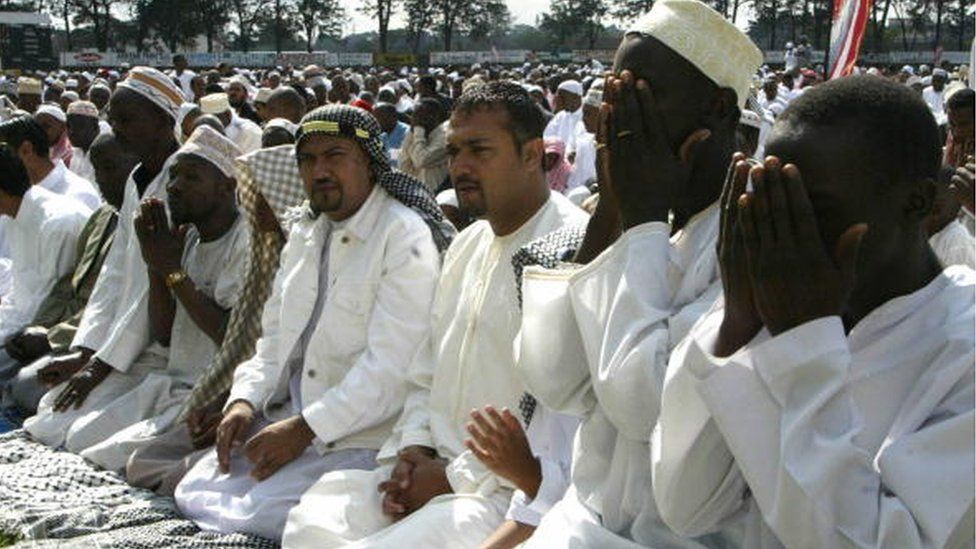 Kenyan Muslims perform Eid al-Fitr prayers at the Sir Ali Muslim Club in Nairobi, 24 October 2006