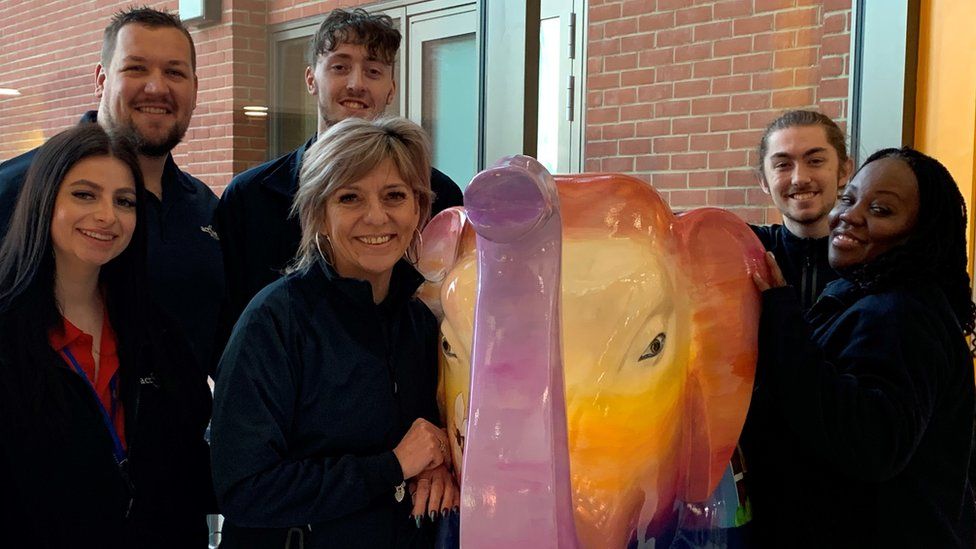 Sunrise the painted elephant statue with people from Active Luton