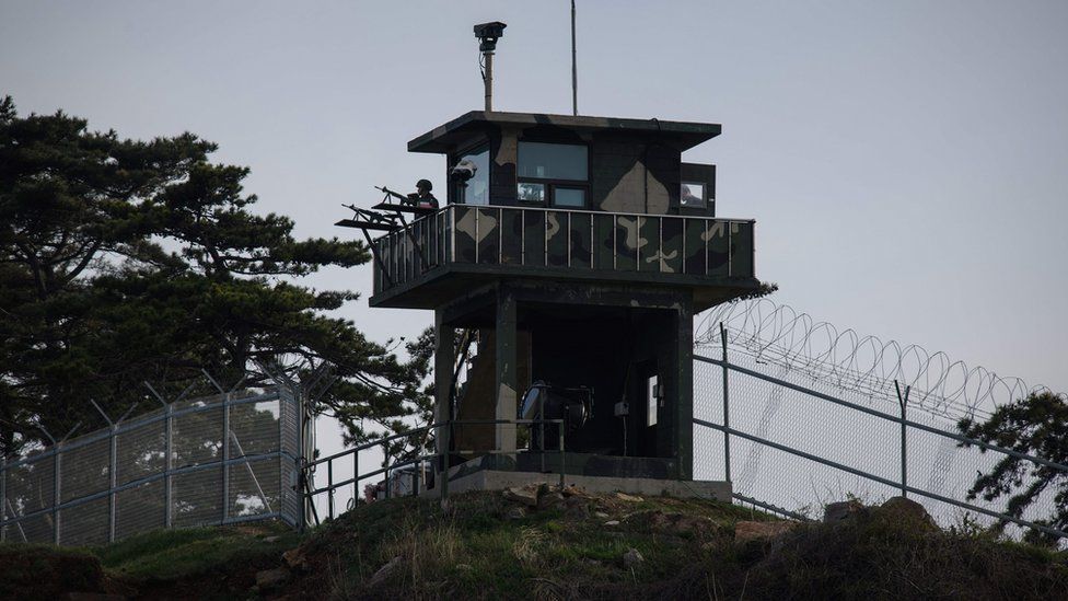 Soldiers in a watchtower on the shore of Yeonpyeong