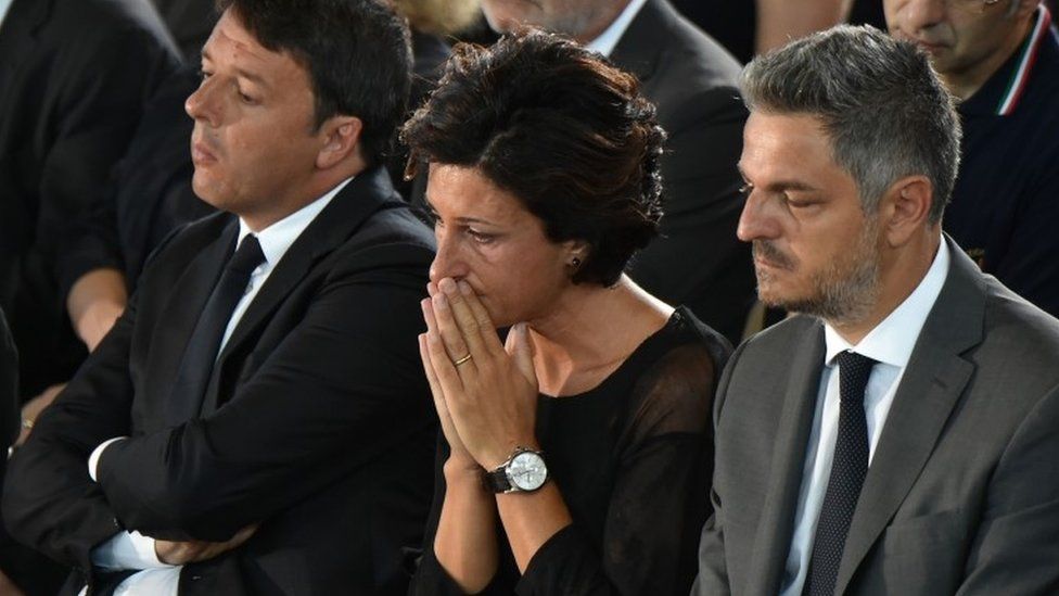Italian Prime Minister Matteo Renzi (l) with his wife Agnese at a funeral for victims of the earthquake, 27 August 2016