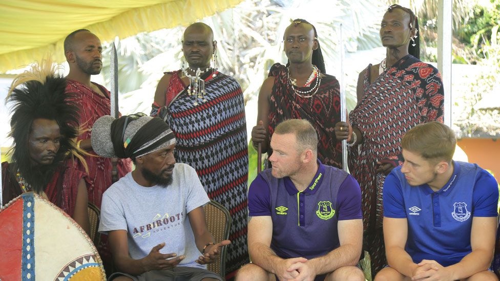 Wayne Rooney with Massai warriors