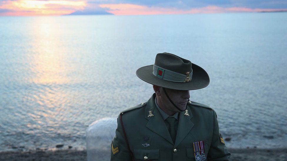 An Australian soldier stands at Anzac Cove in Turkey