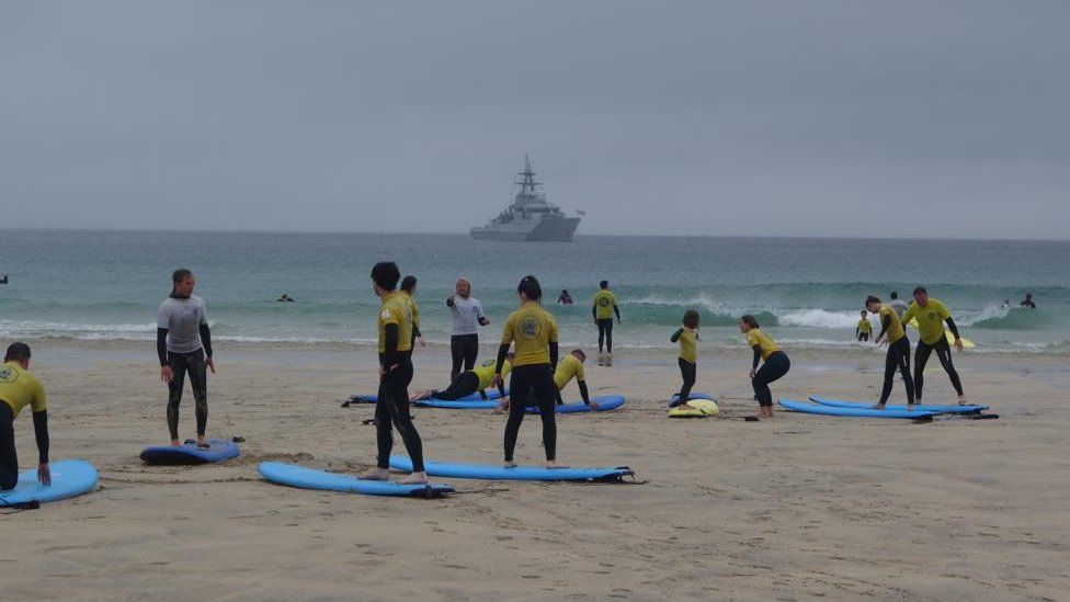 Warship and surf lesson