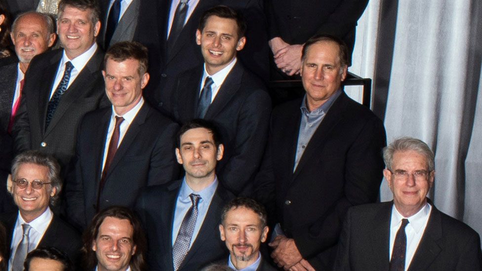 A group of men in the Oscars class photo