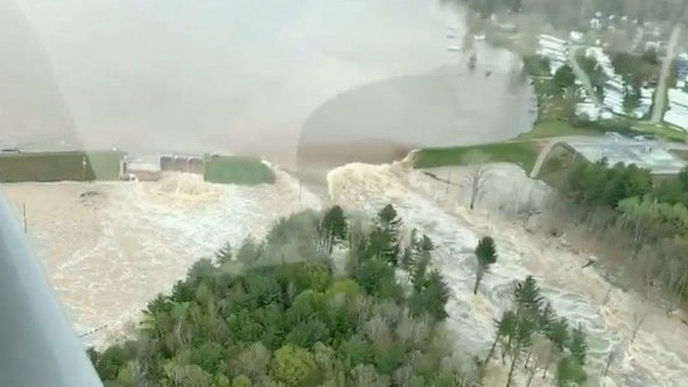 Aerial view of water from a broken Edenville Dam seen flooding the area as it flows towards Wixom Lake in Michigan
