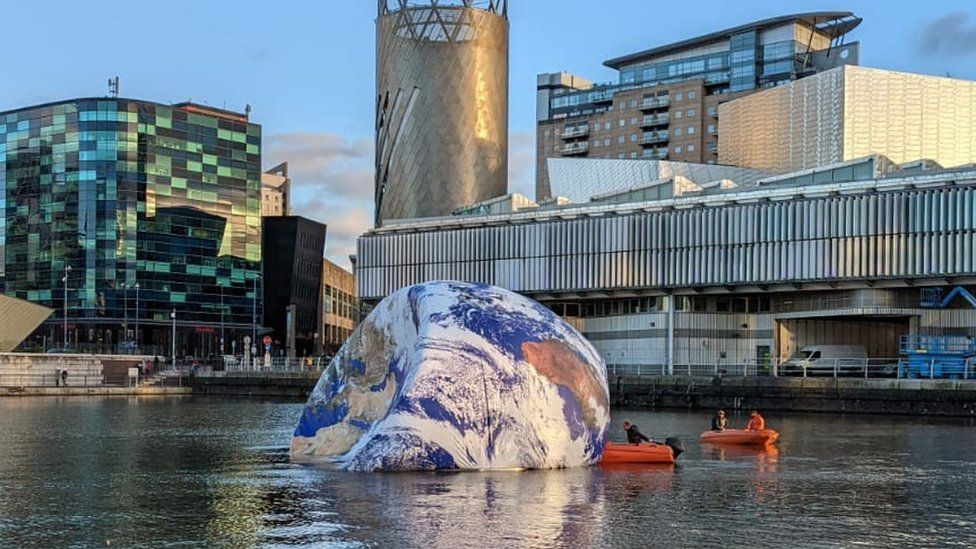 Salford Quays Earth artwork hit by bad weather BBC News