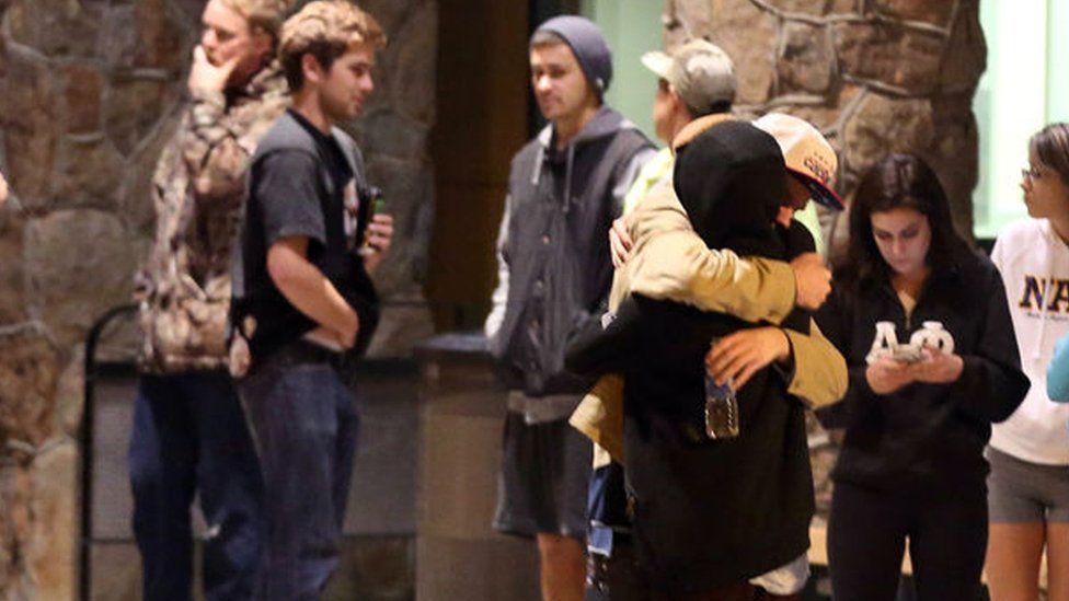 Students embrace at Northern Arizona University following a shooting on 9 October 2015