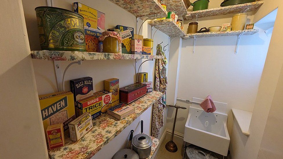 A replica 1950s pantry with products