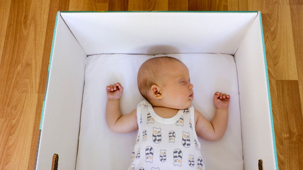 Baby asleep in baby box