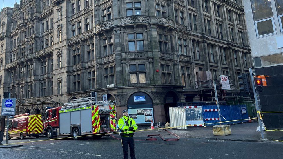 The cordon around the Jenners building has been reduced but emergency services remain on the scene