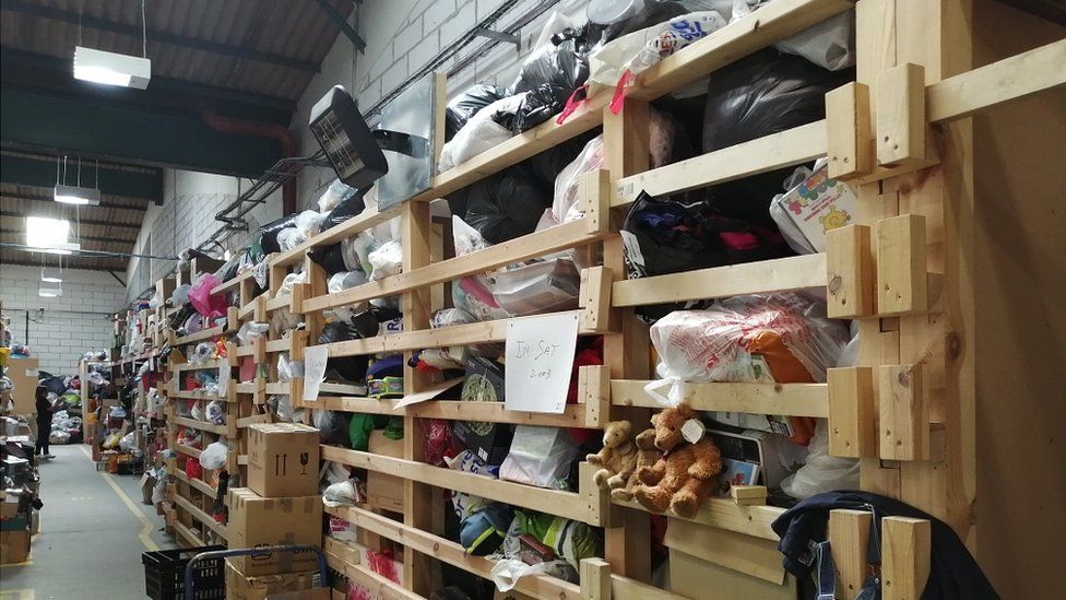 St Helena Hospice, which runs 13 shops in north Essex, says its warehouse is currently "full to the brim".