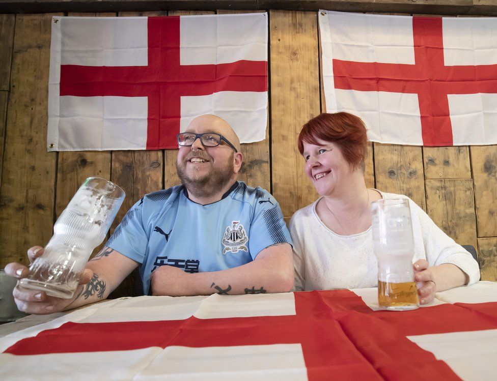 Customers Scott Jones and Laura Jones at the Sawmill Bar in South Elmsall, Yorkshire, where a Brexit party is being held throughout the day ahead of the UK leaving the European Union at 11pm this evening.